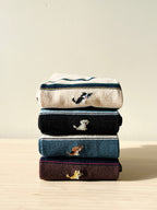 Unisex combed cotton crew socks featuring a cute dog illustration and classic stripes
