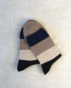 Striped sock with Nave, Grey, and Cream colors on a white background