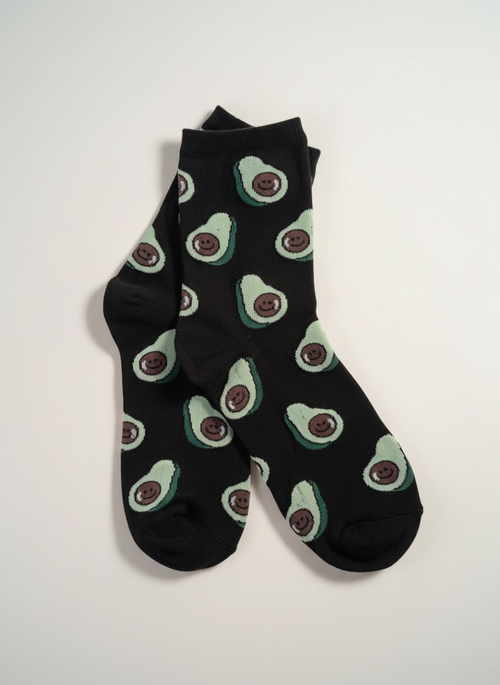 Black socks with avocado pattern on a white background